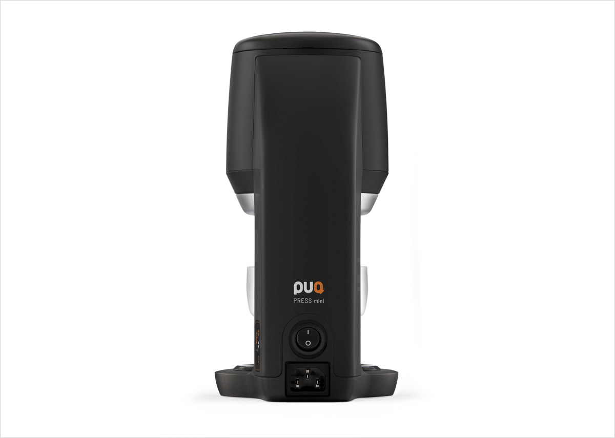 PUQ Press MINI negro en vista posterior